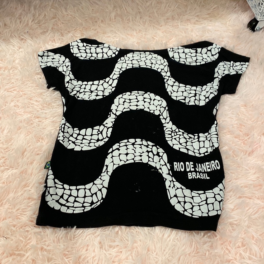 Black and white off the shoulder top with snake print around the shirt